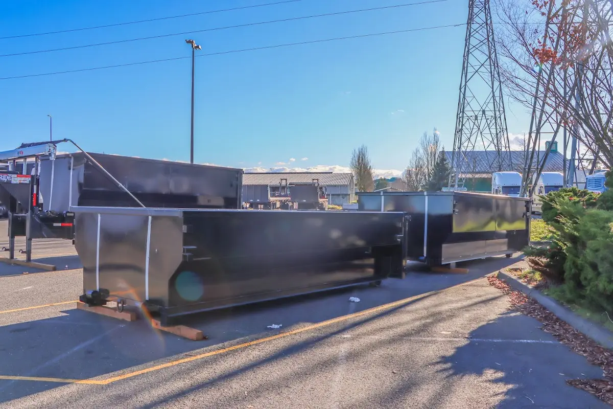 Roll-off dumpster ready for waste disposal at job site for Construction Dumpster Rental in Belvedere Park